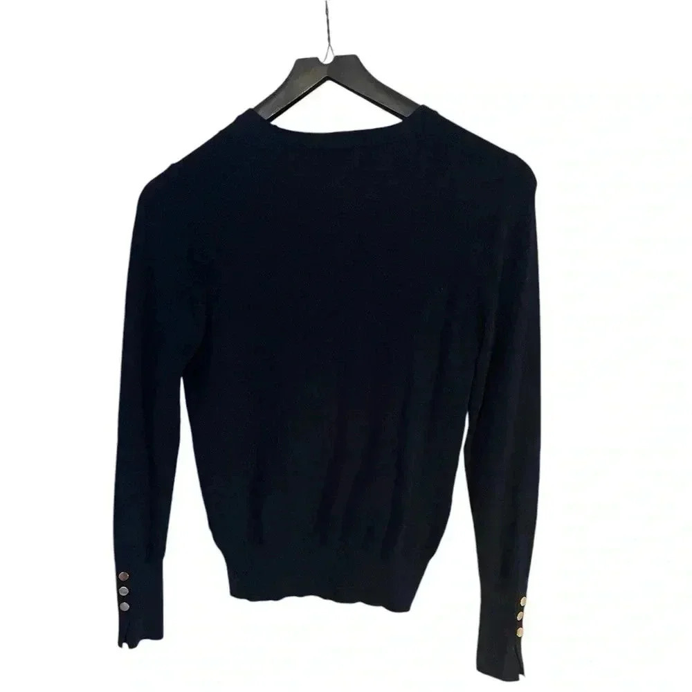 Women’s dark blue Tahari traditional long sleeve sweater. Size medium.